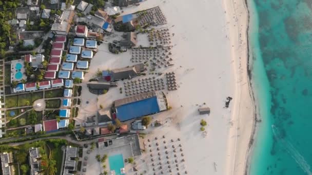 Top View on Beach Line with Resorts at Zanzibar Nungwi beach at evening time with blue Indian ocean — Stock video
