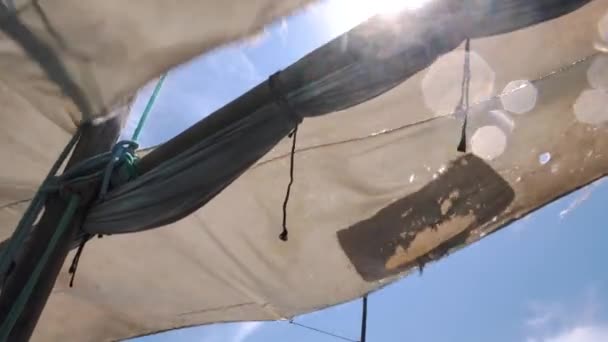 Dihapuskan Sails Floating Against Blue Midday Sky with Particular Clouds — Stok Video