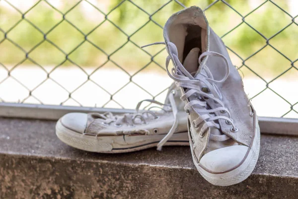 Viejas zapatillas colgando Stock Photos, Royalty Free Viejas zapatillas  colgando Images - Page 3 | Depositphotos