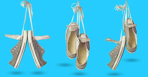 Eski kirli spor ayakkabı asılı seti.