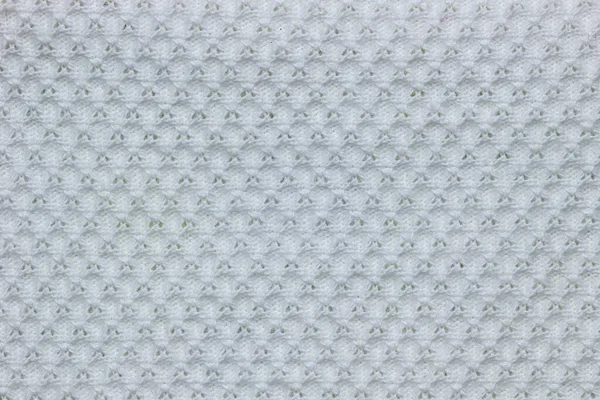 Texture of white shirt fabric.