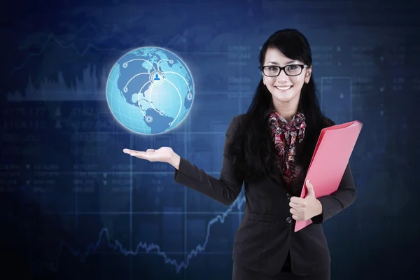 Businesswoman with globe and social network — Stock Photo, Image