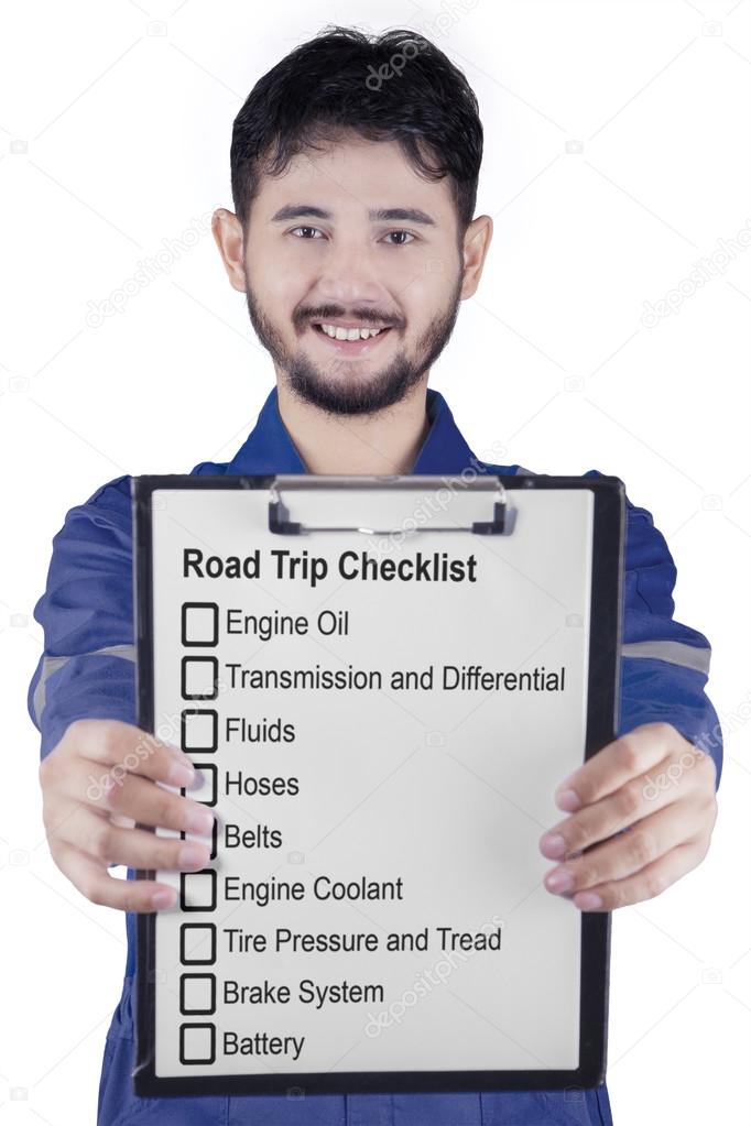 Workshop worker shows road trip tips
