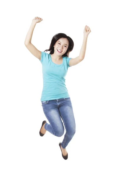 Beautiful woman jumping in the air — Stock Photo, Image