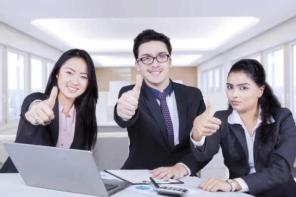 Young entrepreneur with thumb up — Stok fotoğraf