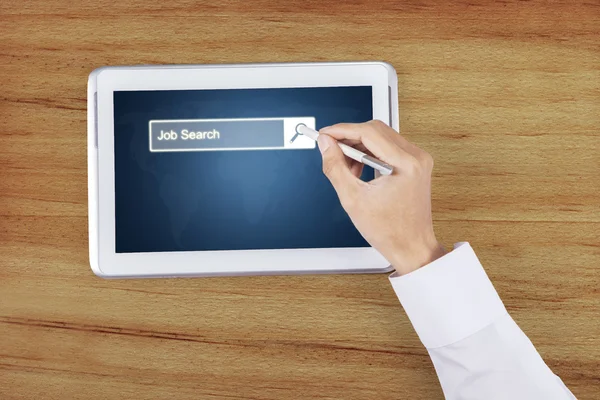 Hand pressing job search bar on tablet — Stock Photo, Image