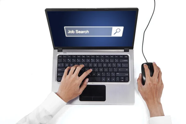 Hand med laptop och Jobbsökning bar — Stockfoto