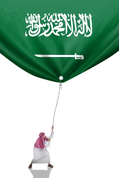La persona de Oriente Medio tira de la bandera árabe — Foto de Stock