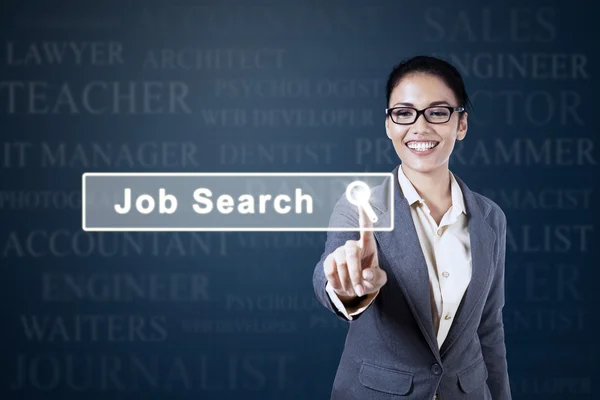 Młoda kobieta interesu, dotykając przycisk Szukaj pracy — Zdjęcie stockowe