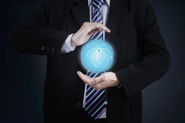 Businessman showing 3d globe — Stock Photo, Image