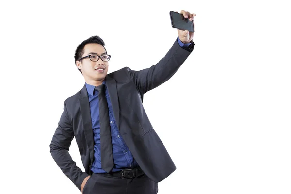 Businessman taking a selfie picture — Stockfoto