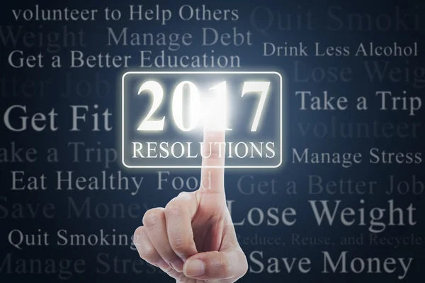 Hand touches resolutions with numbers 2017 — Φωτογραφία Αρχείου