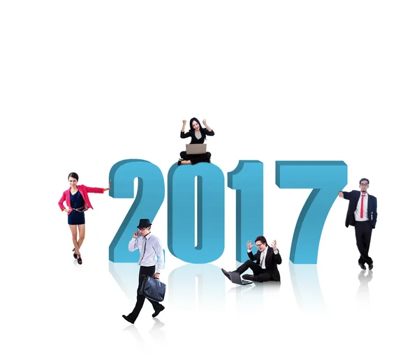Business team with blue number 2017 — Stock Photo, Image