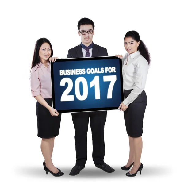 Business group holding number 2017 on billboard — Stock Photo, Image
