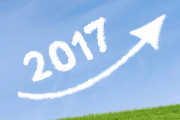 Cloud is shaping numbers 2017 and upward arrow — Stock Photo, Image