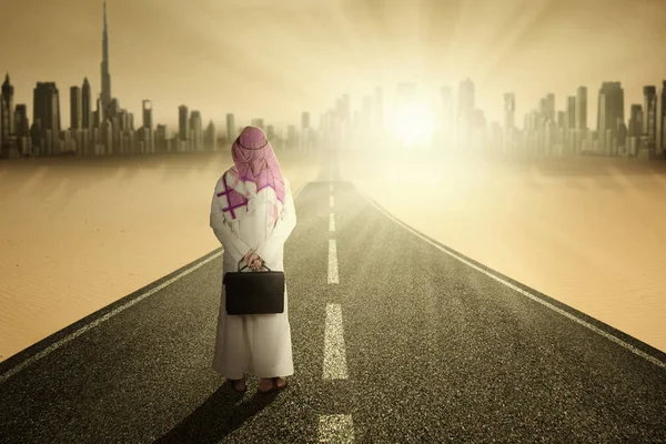 Arabic entrepreneur standing on road — Stock Photo, Image