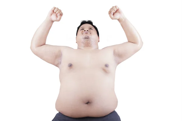 Fat man raised his hands in studio — Stock Photo, Image