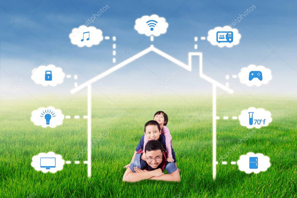 Dad and kids lying under smart home design