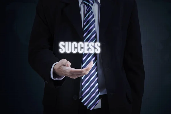 Businessperson hand holds success word — Stock Photo, Image