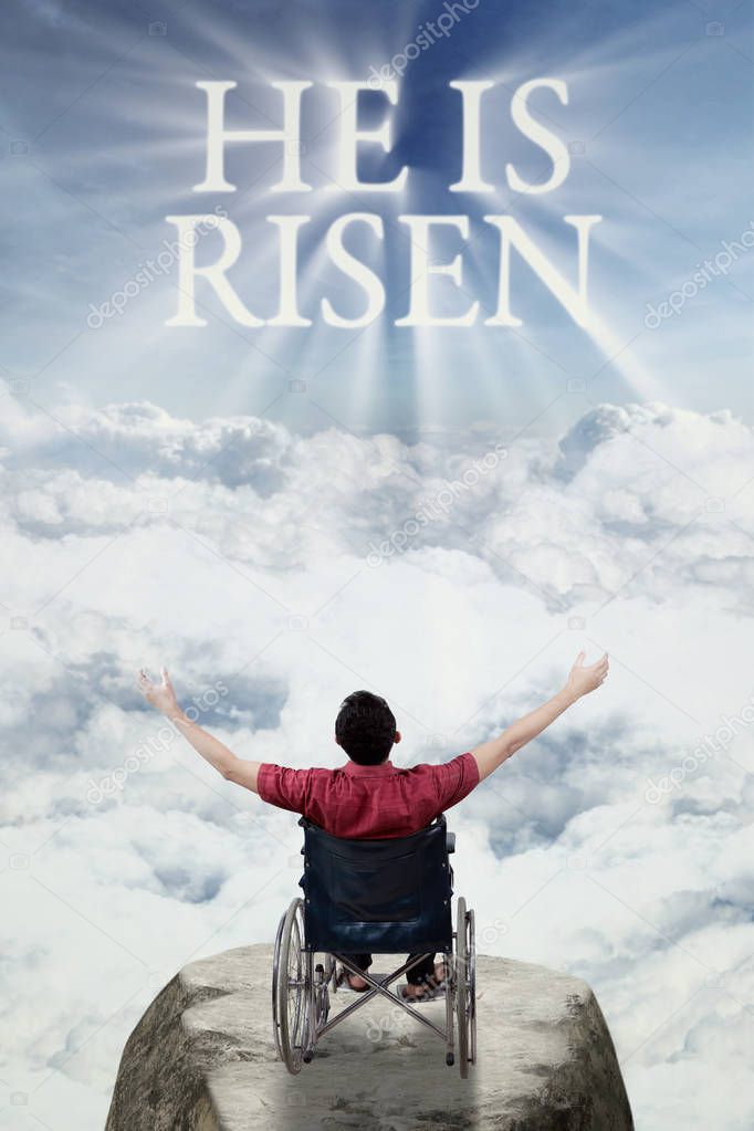 Disabled male with text of he is risen