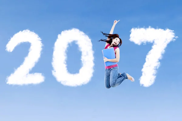College student jumping with 2017 — Stock Photo, Image