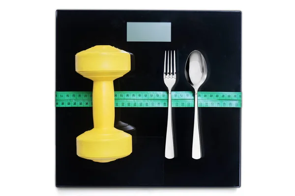 哑铃和餐具与测量工具 — 图库照片