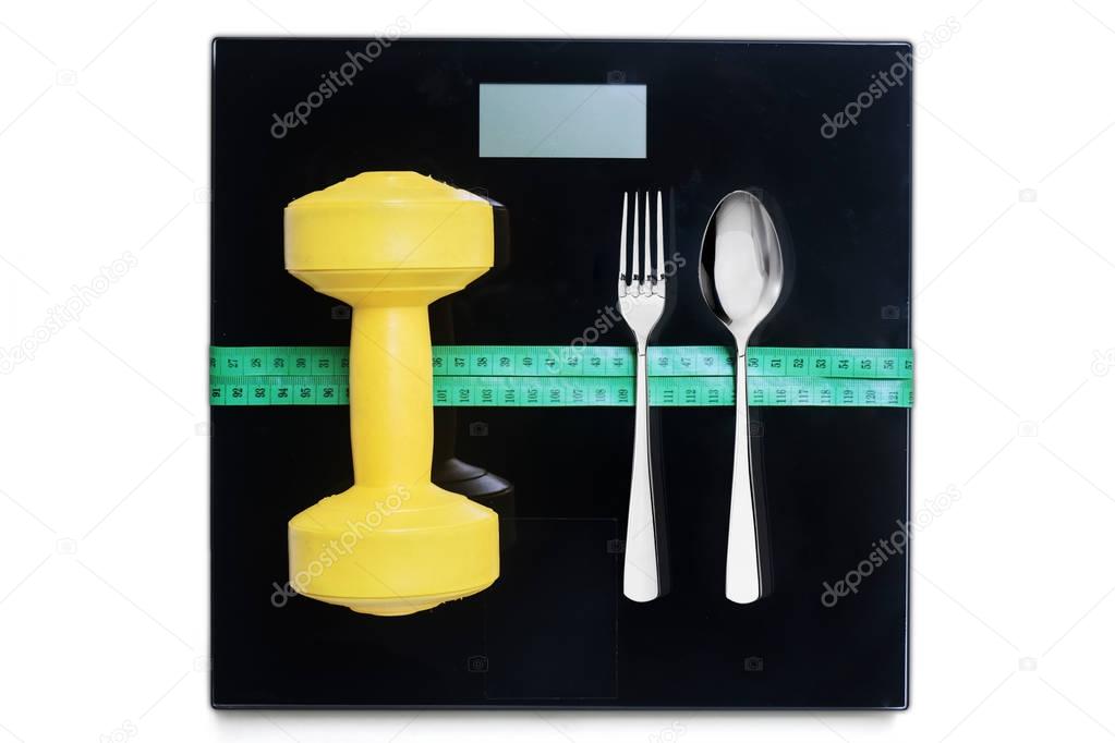 Dumbbells and cutlery with measurement tools