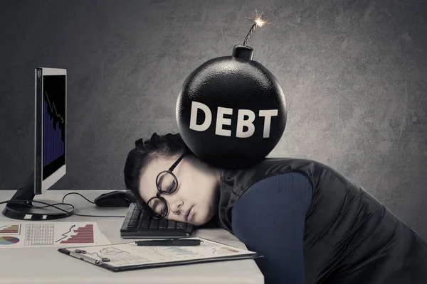 Entrepreneur feels tired with bomb of debt — Stock Photo, Image