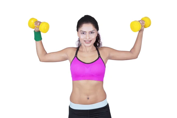 Indian woman doing exercise with dumbbells — Stock Photo, Image