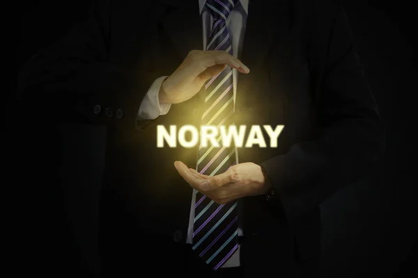 Бизнесмен, защищающий слово Норвегии — стоковое фото