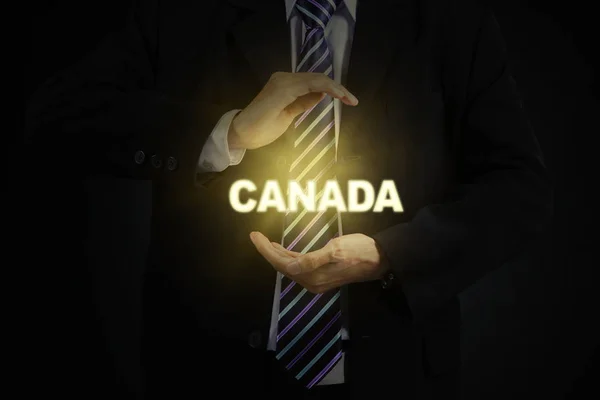 Мужчина менеджер со словом Канада — стоковое фото