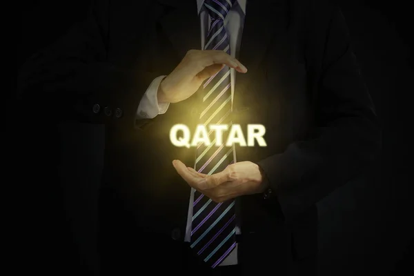 Qatar palabra en palmeras hombre de negocios — Foto de Stock