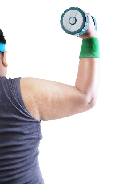 Obese man flexing muscles with barbell on studio — Stock Photo, Image