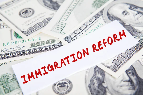 Dollars currency with Immigration Reform word — Stock Photo, Image