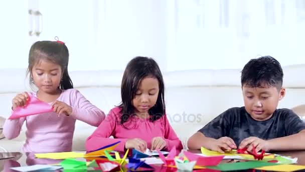 Creative children playing origami — Stock Video