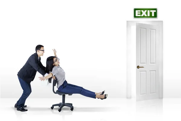 Entrepreneur moving fast toward exit door — Stock Photo, Image