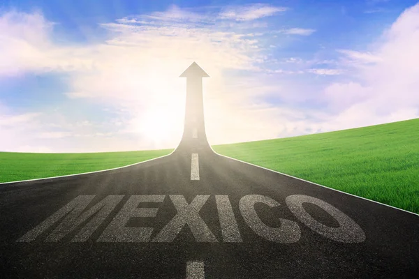 Highway with word of Mexico and arrow upward — Stock Photo, Image