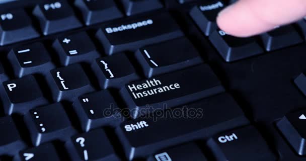 Hand pressing Health Insurance button — Stock Video