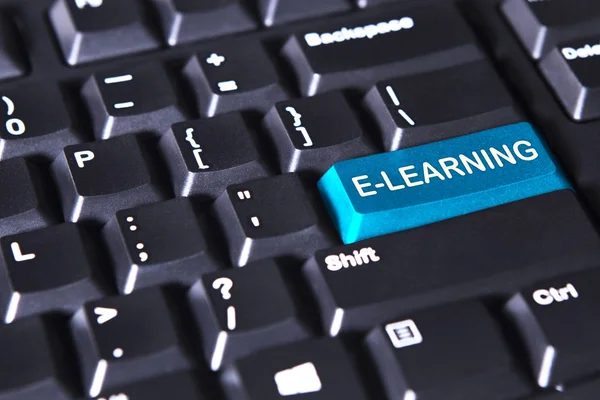 Text of e-learning on the blue button — Stock Photo, Image