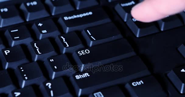 Finger pushing seo button — Stock Video