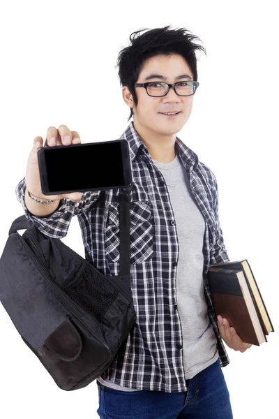 Schoolboy showing blank screen of a smartphone — Stock Photo, Image