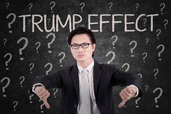 Angry businessman with Trump Effect word — Stock Photo, Image