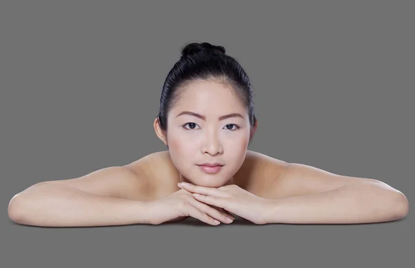 Closeup model with clean skin on gray background — Stock Photo, Image