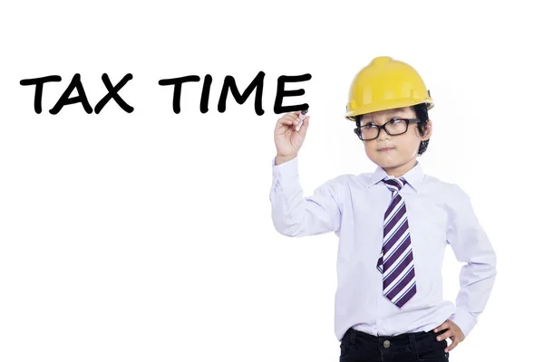 Little entrepreneur writes tax time — Stock Photo, Image