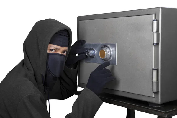 Thief trying to open safe-deposit box — Stock Photo, Image