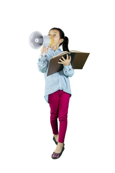 Little student speaking on megaphone — Stock Photo, Image