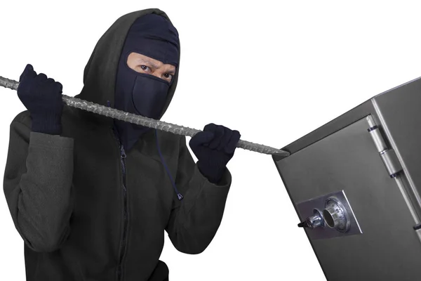 Burglar opens safe-deposit box with crowbar — Stock Photo, Image