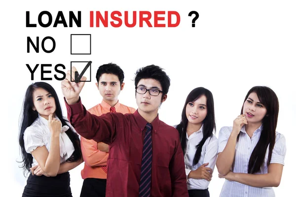 Business people with text of loan insured — Stock Photo, Image