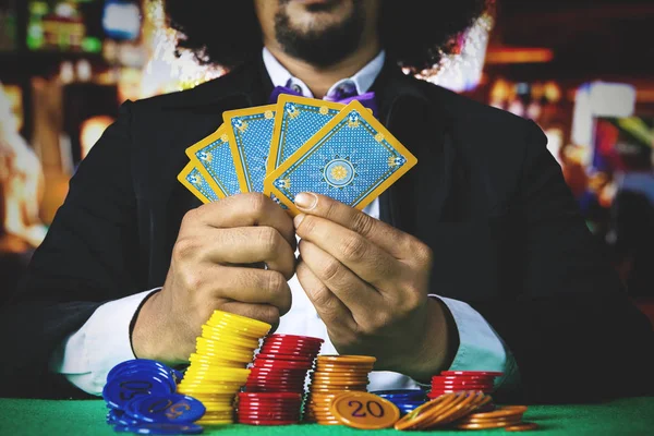 Man gambling with poker cards — Stock Photo, Image