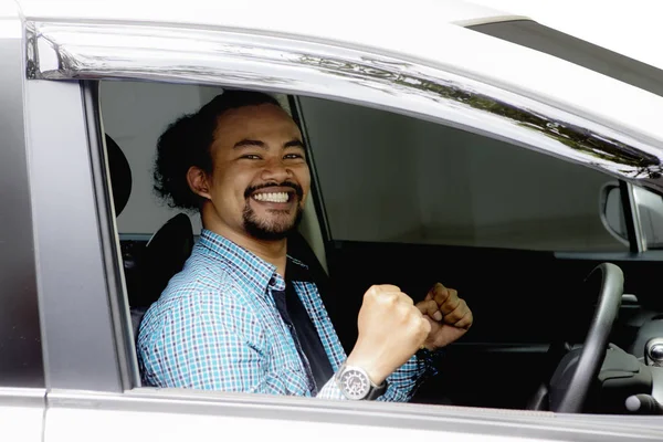 Casual Afro man inside new car — Stock Photo, Image